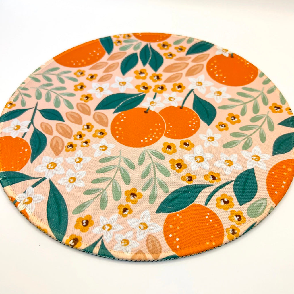Angle view of Orange Floral Mousepad.
