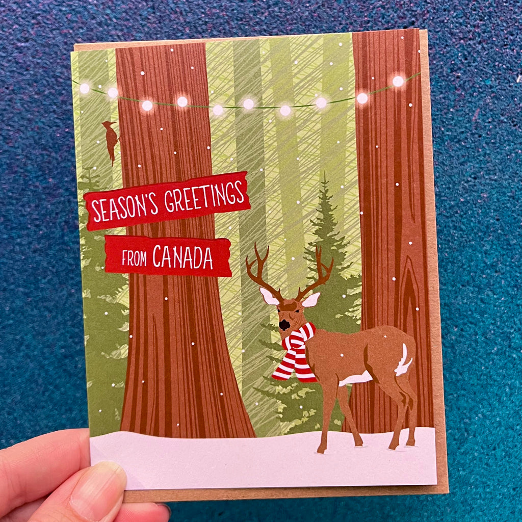 Deer In Scarf Seasons Greetings From Canada Card.