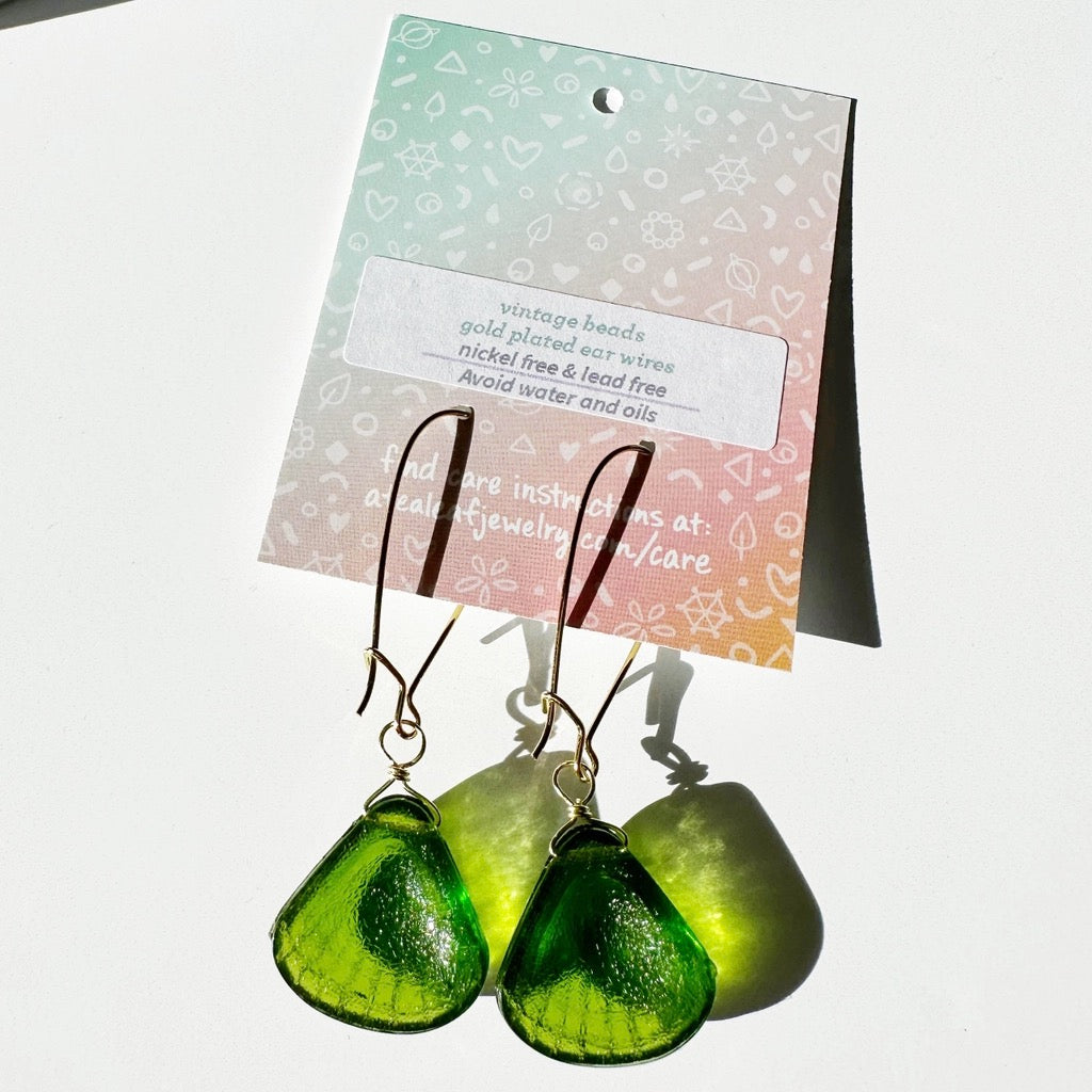 Earrings with Vintage Cockle Seashell Green Lucite Beads packaging.