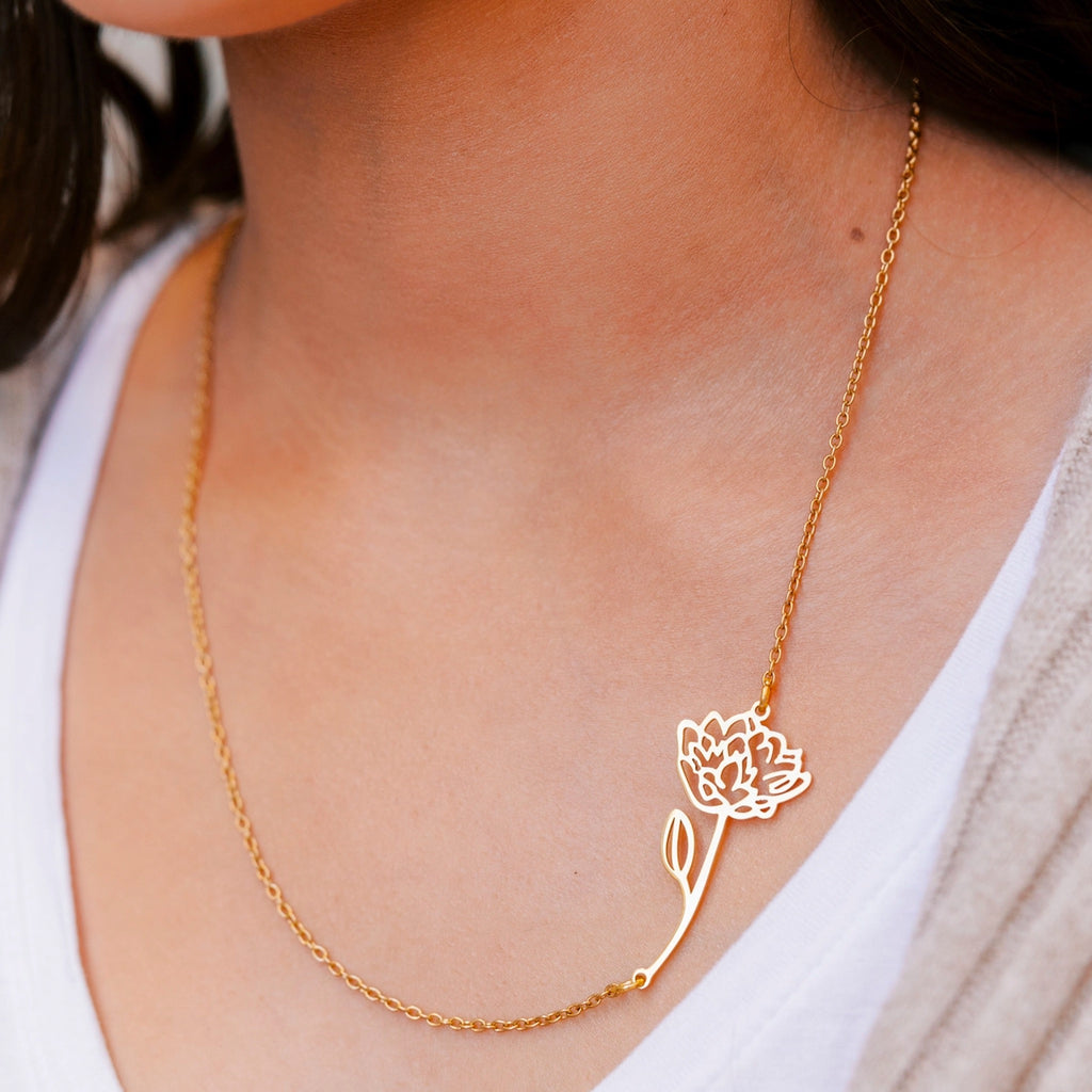 Person wearing Gold Rose Necklace.
