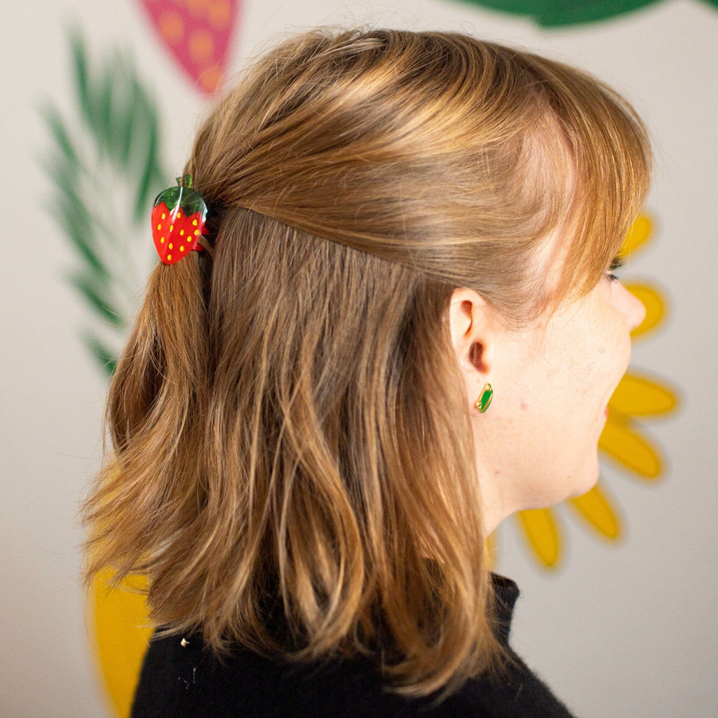 Person wearing Mini Strawberry Hair Claw.