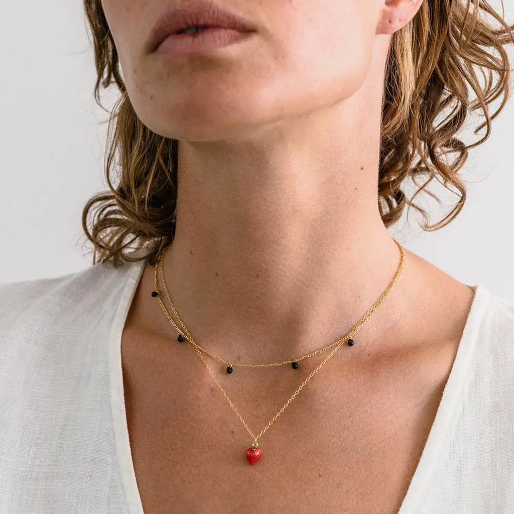 Person wearing Summer Strawberry Necklace.