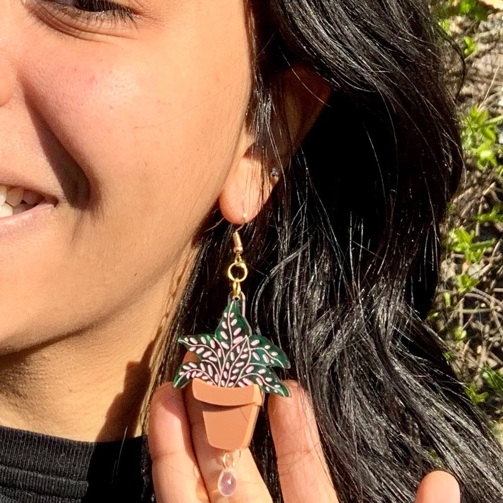 Person wearing Terracotta Plants Earrings.