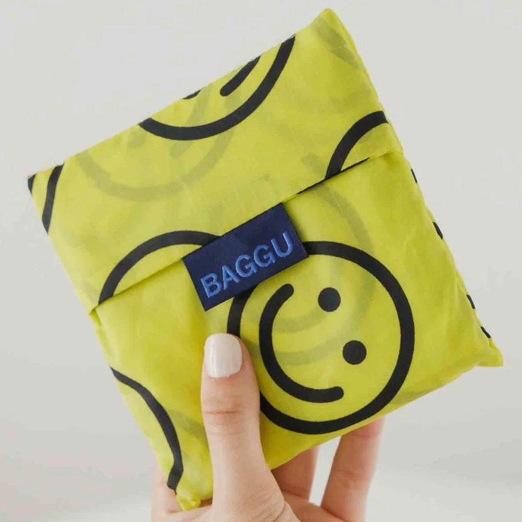 Standard Baggu Yellow Smiley Face folded.