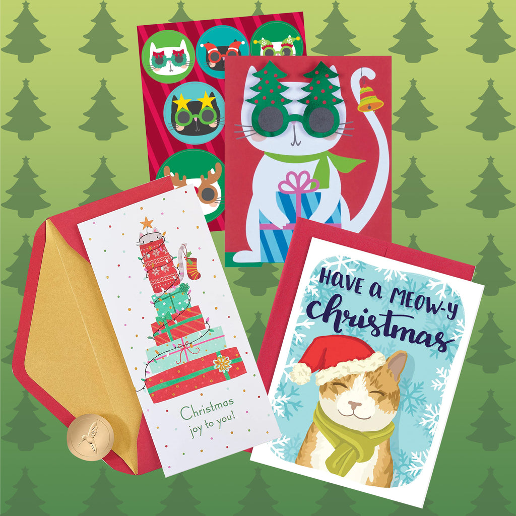 Cat themed boxed holiday cards collection image.