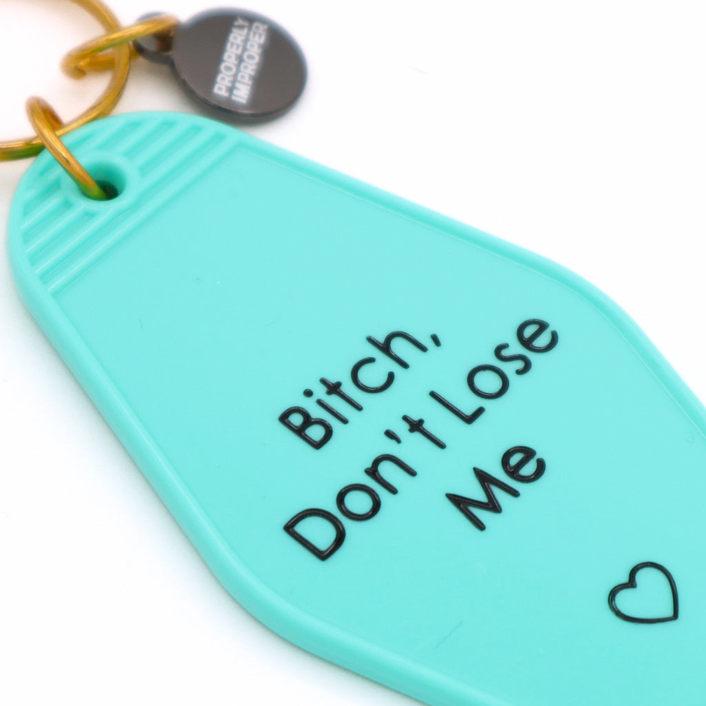 Angle view of Bitch Don't Lose Me Motel Keychain.