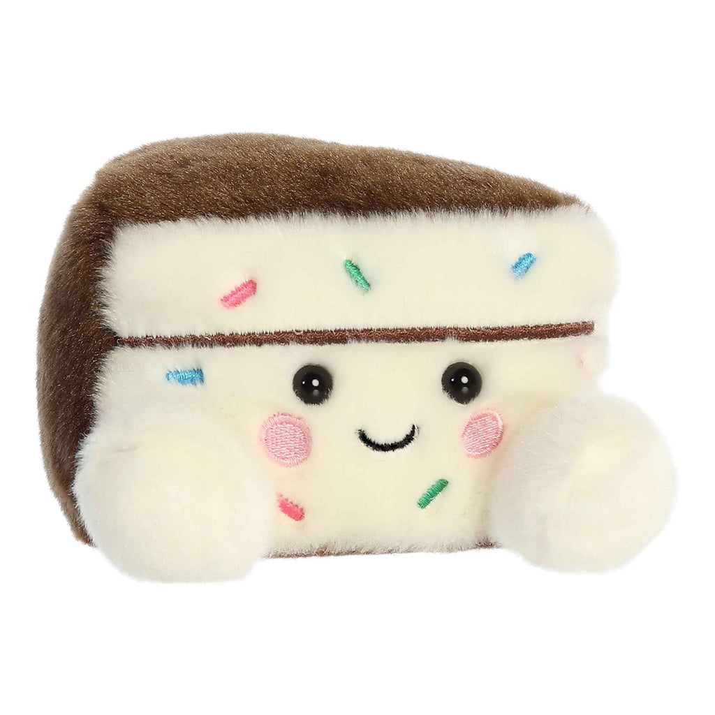 Angle view of Sprinkles Cake Slice Palm Pal.