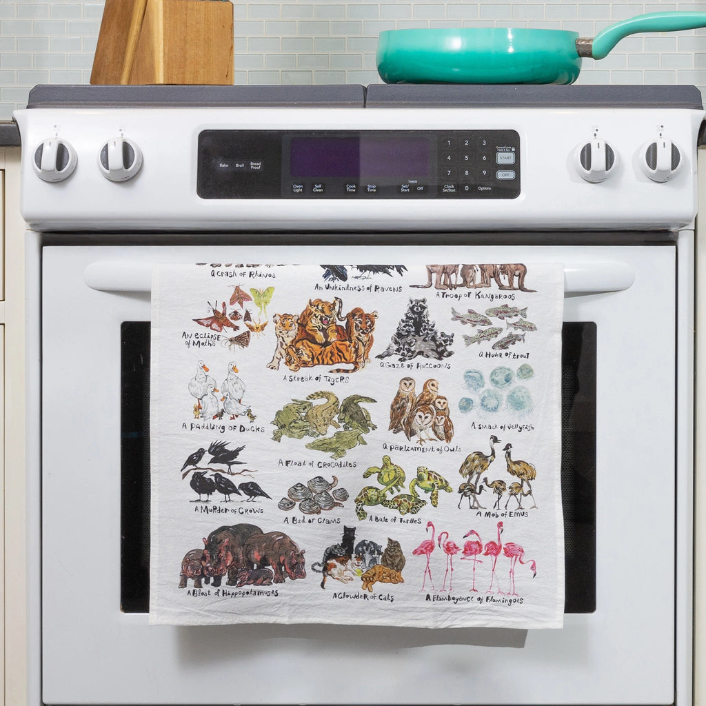 Animal Groupings Towel on stove.