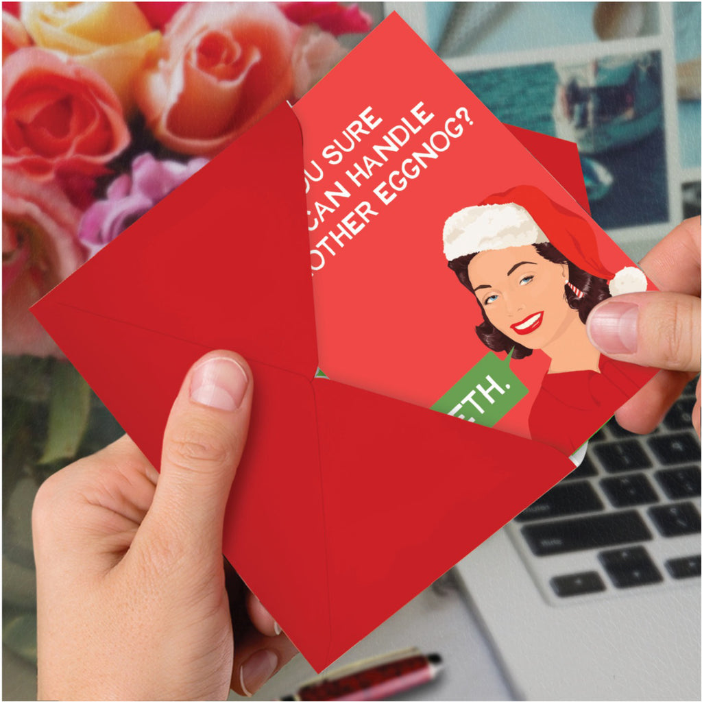 Another Eggnog Christmas Card in hand.