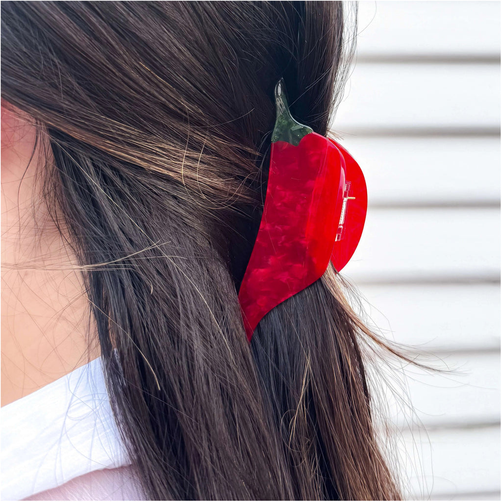 Another person wearing Midi Chili Pepper Hair Claw Clip.