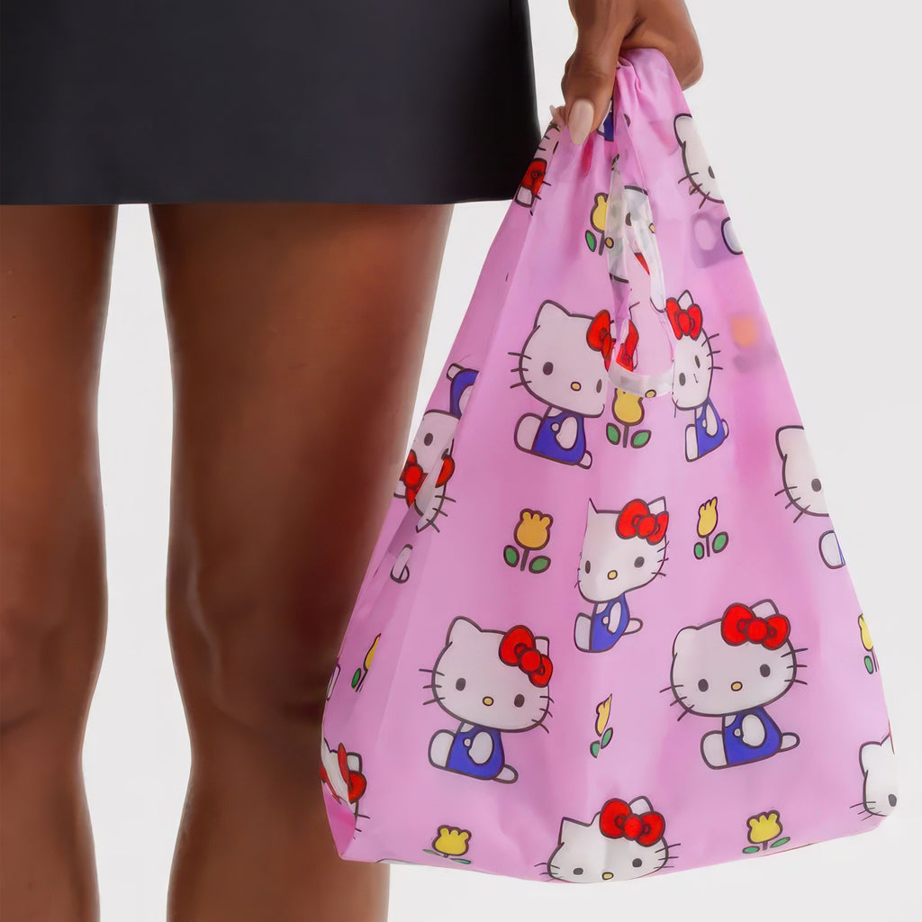 Baby Baggu Hello Kitty Pink in hand.