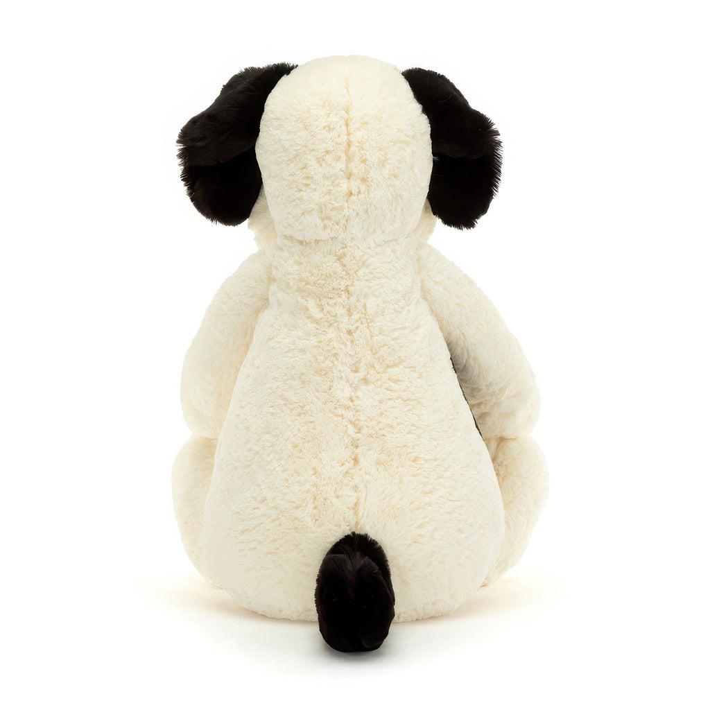 Back of Bashful Black & Cream Puppy Original.