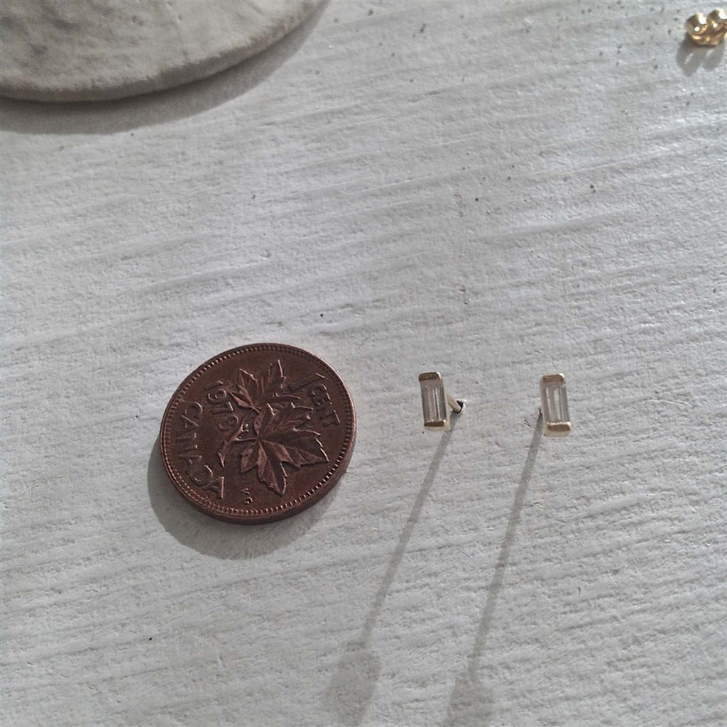 Baguette Crystal Stud Earrings Gold with penny.