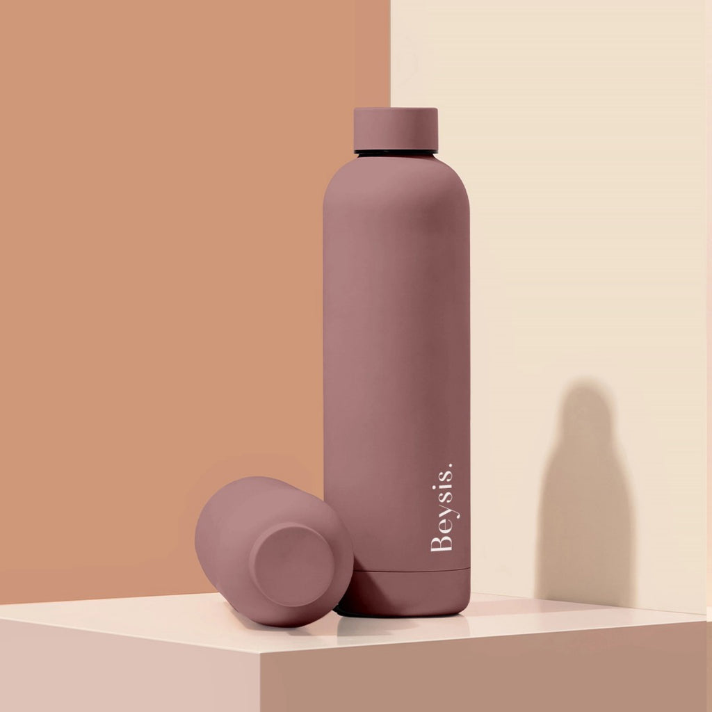 Beysis Water Bottle Matte Plum 1L / 34oz on table.