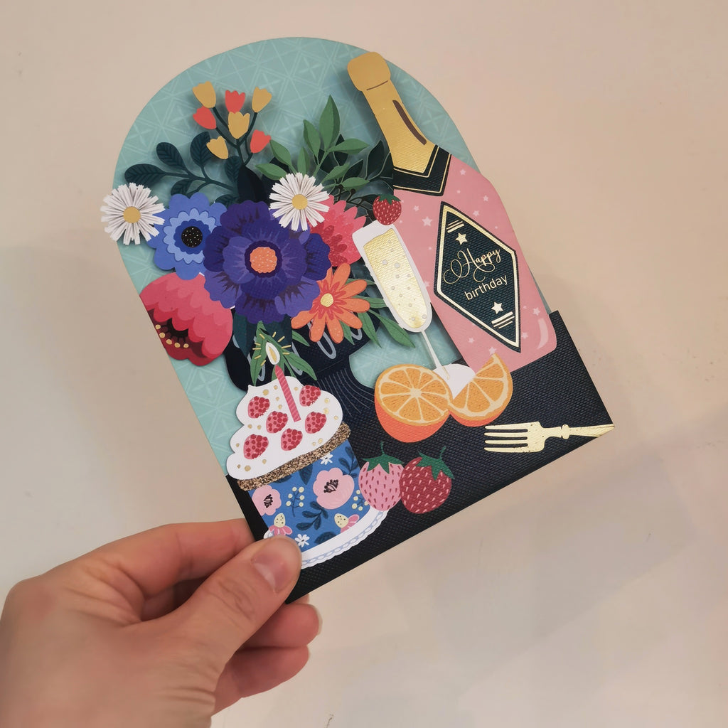 Birthday Champagne Laser Cut Card in hand.