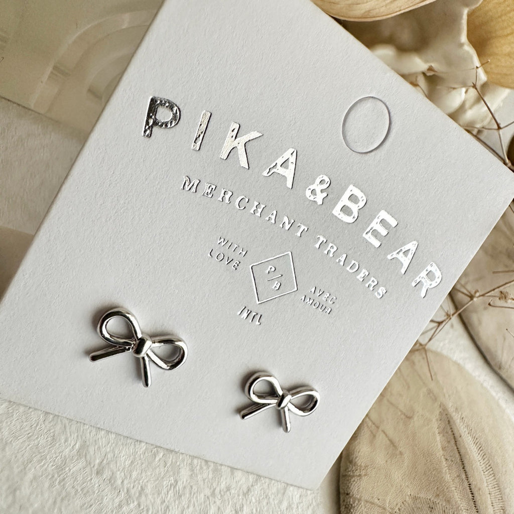 Bow Stud Earrings Silver packaging.