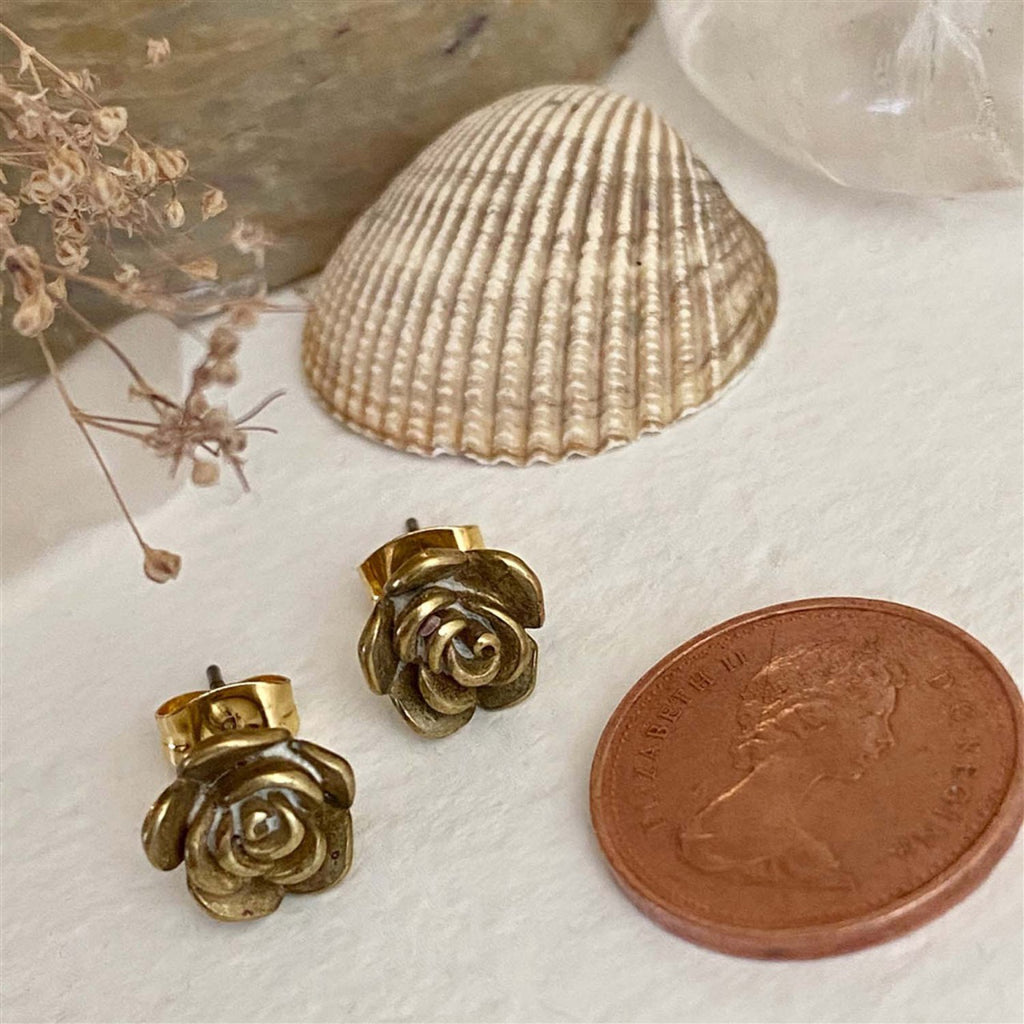 Bronze Rose Stud Earrings with penny.