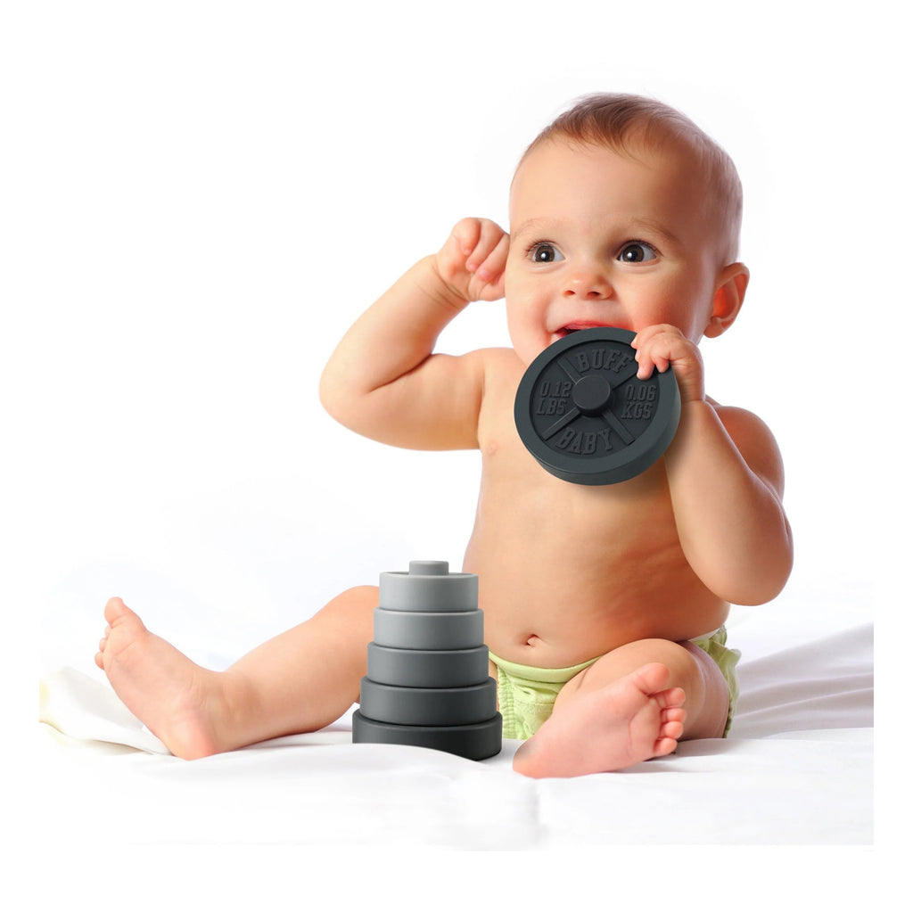 Buff Baby Weight Plate Stacker being held.