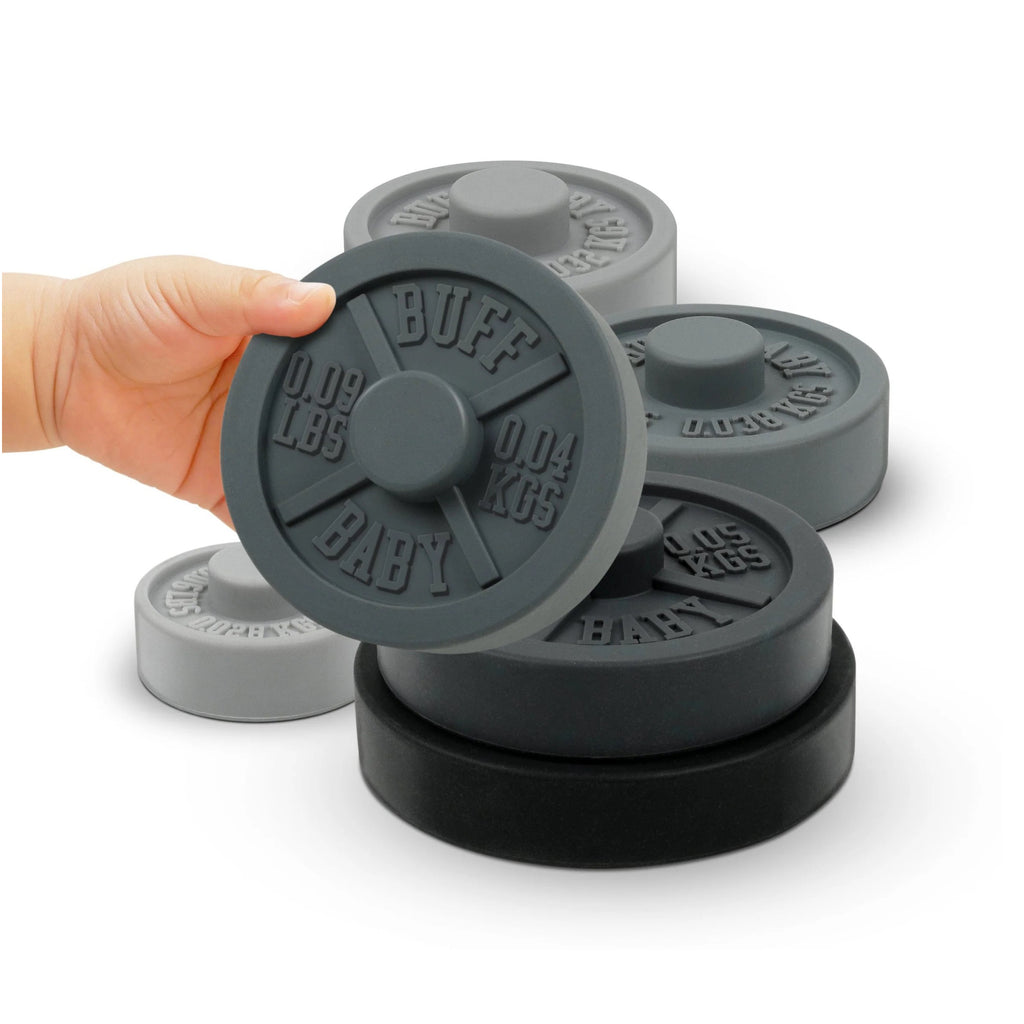 Buff Baby Weight Plate Stacker in hand.