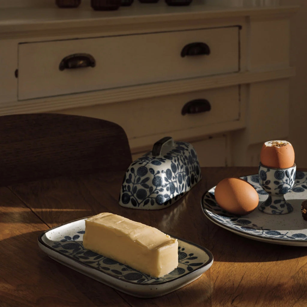 Calendula Element Butter Dish on table.