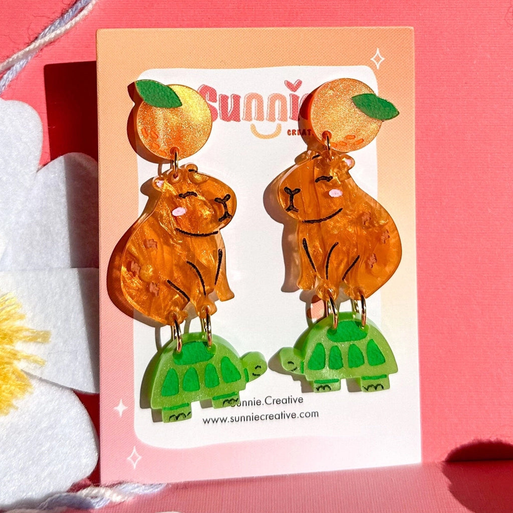 Cappy the Capybara Earrings packaging.