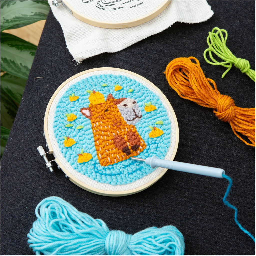 Capybara Punch Needle on table.