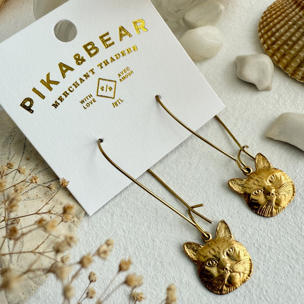 Cat Face Drop Earrings Brass packaging.