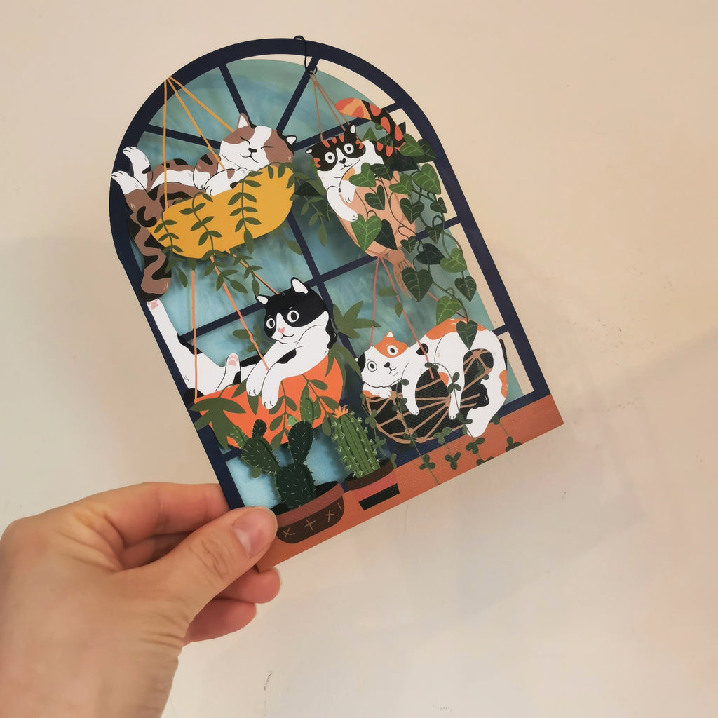 Cats And Plants Laser Cut Card in hand.
