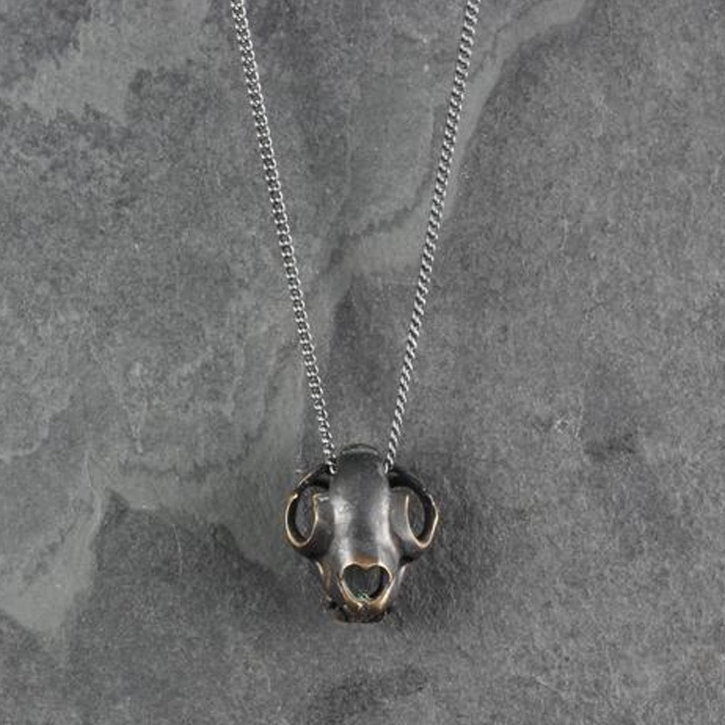 Close-up view of Black Cat Skull Necklace Oxidized Bronze.