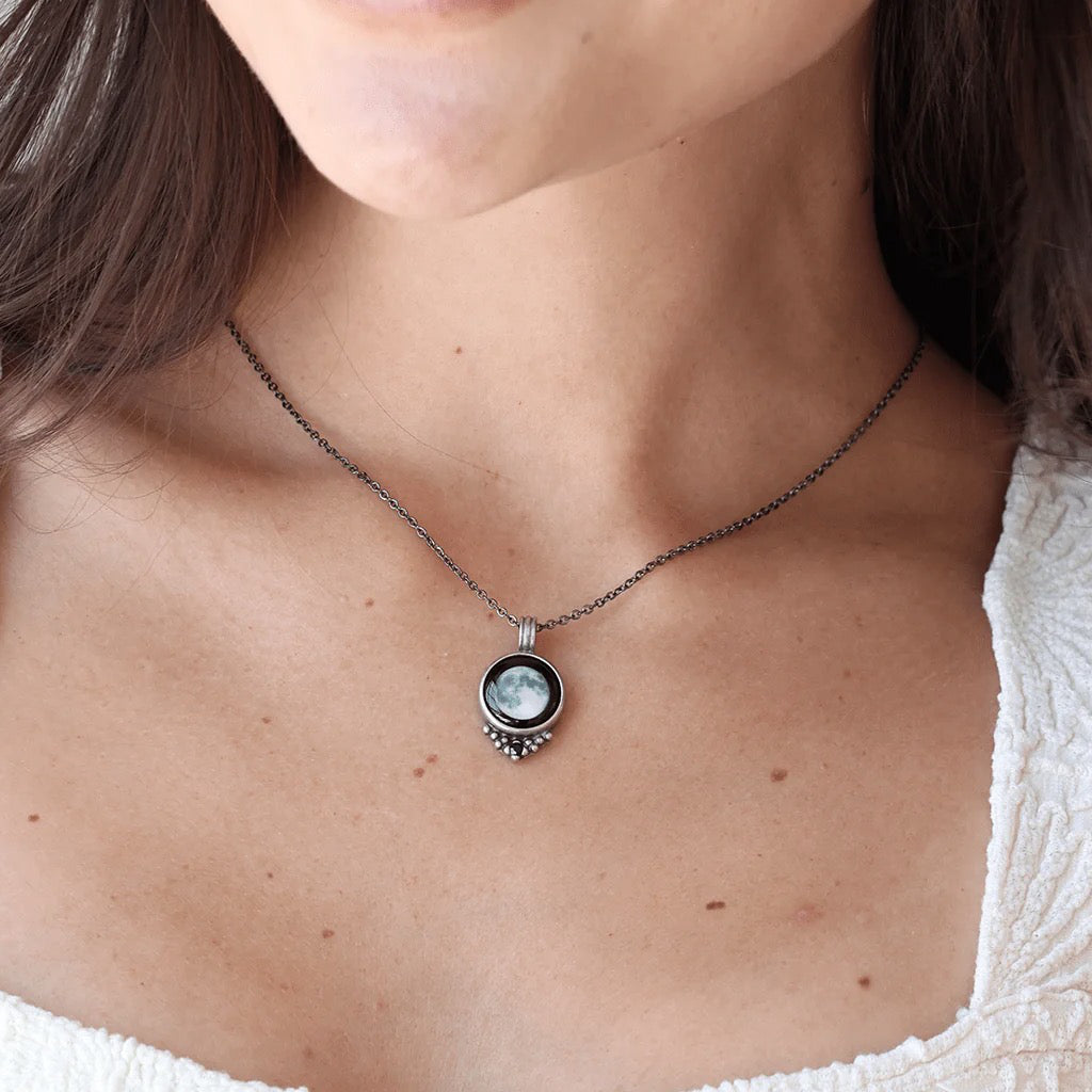 Close-up view of Necklace With Black Crystal Full Moon.