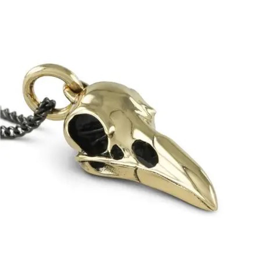 Close-up view of Raven Skull Necklace Bronze.