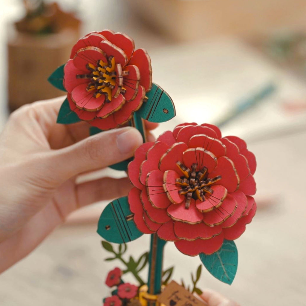 Close-up view of Red Camellia 3D Wooden Flower Puzzle.