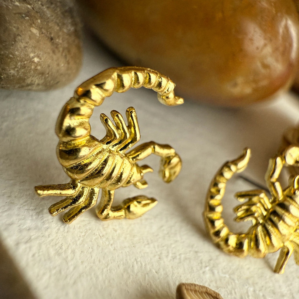 Close-up view of Scorpion Stud Earrings Brass.