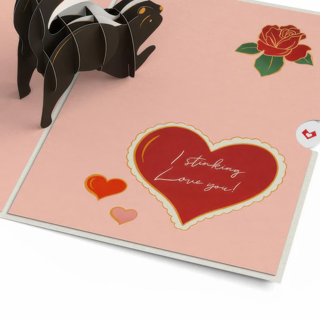 Close-up view of Stinking Love You Skunk Valentine Pop-Up Card.
