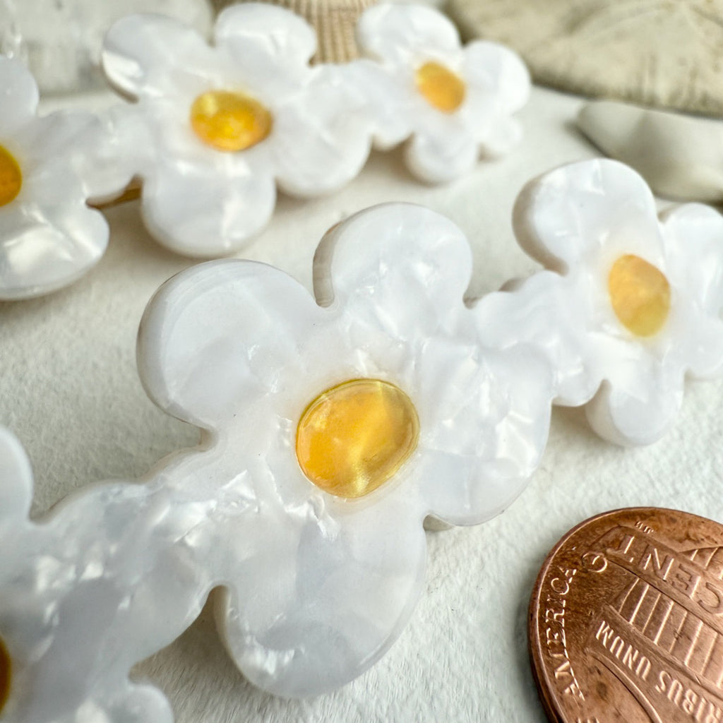 Close-up view of Triple Flower Duckbill Hair Clip White.
