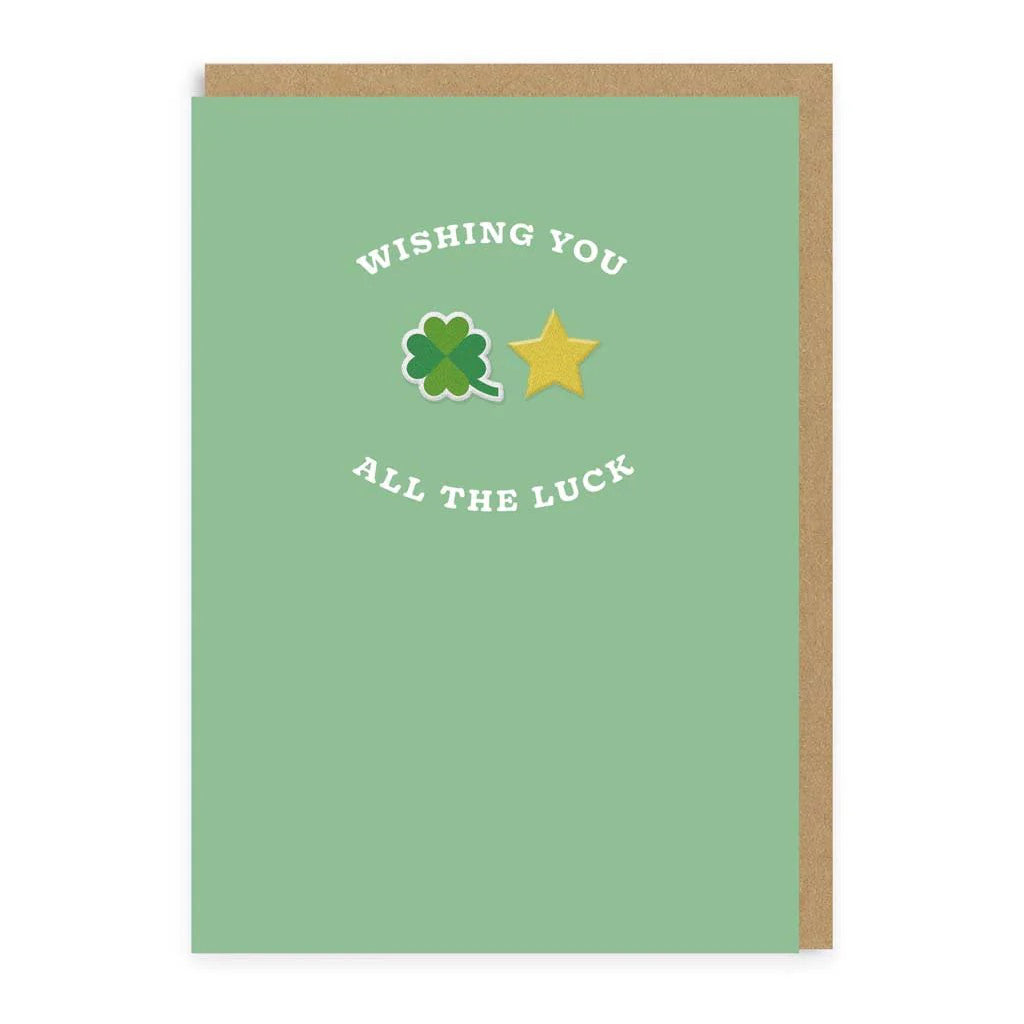 A four-leaf clover and star-themed good luck card, representing fortune and optimism