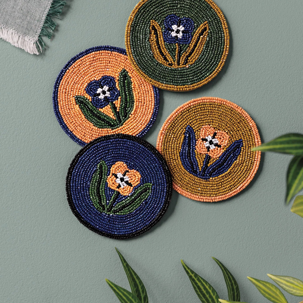 Coaster Set/4 Beaded Teppi on wall.