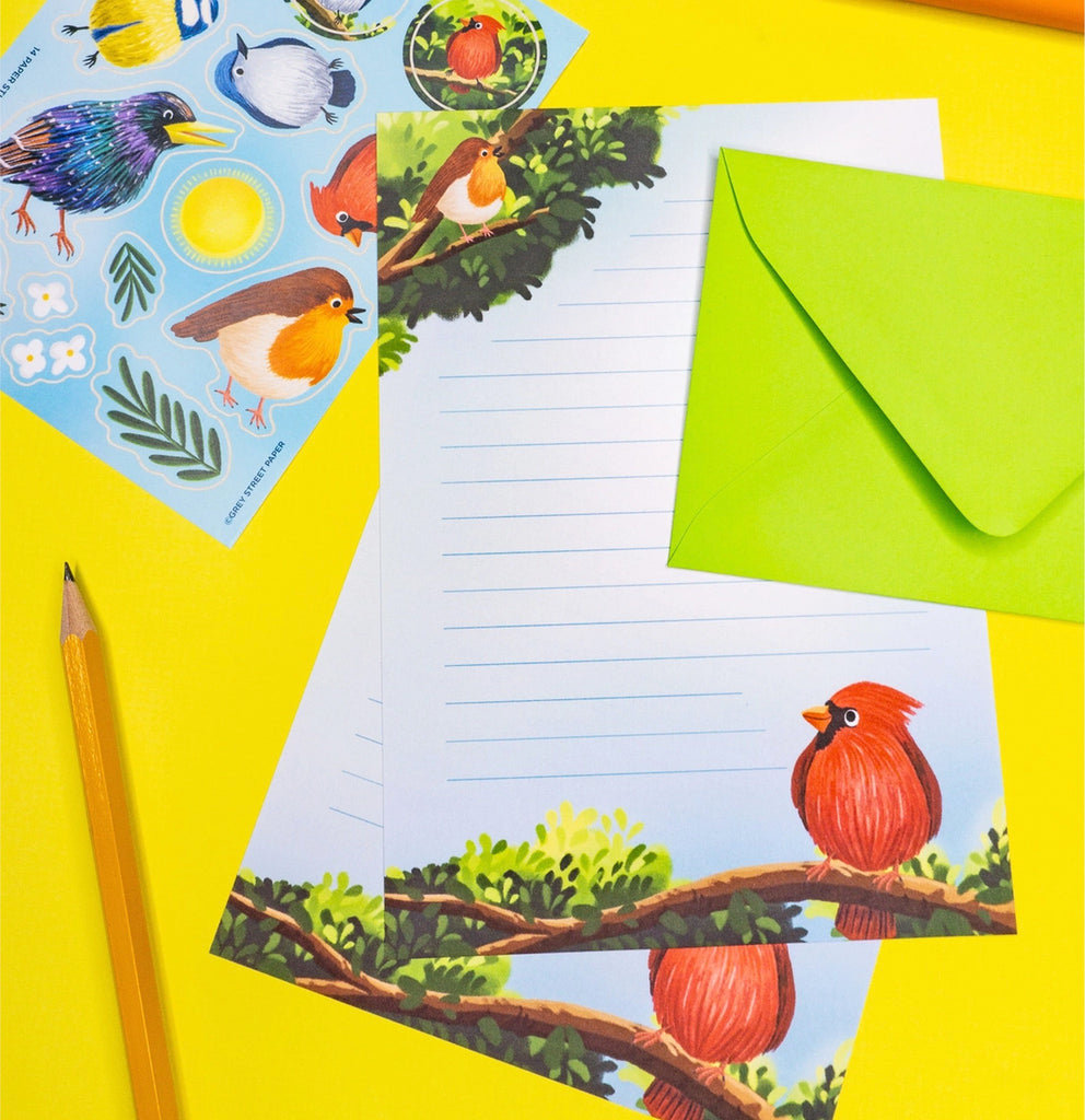 Colorful Birds Letter Writing Set on table.