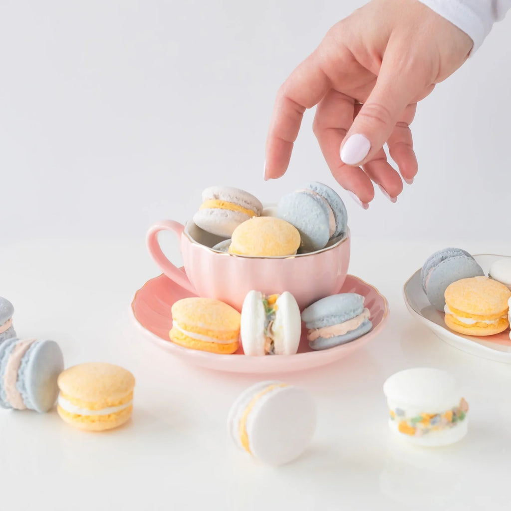 Cotton Candy Bath Macarons on table.