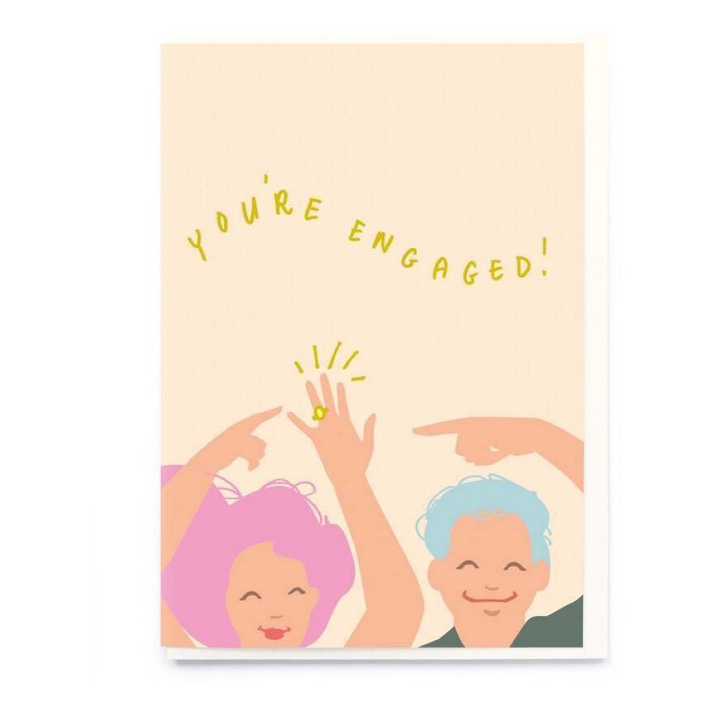 Couple Pointing To Ring Engagement Card.