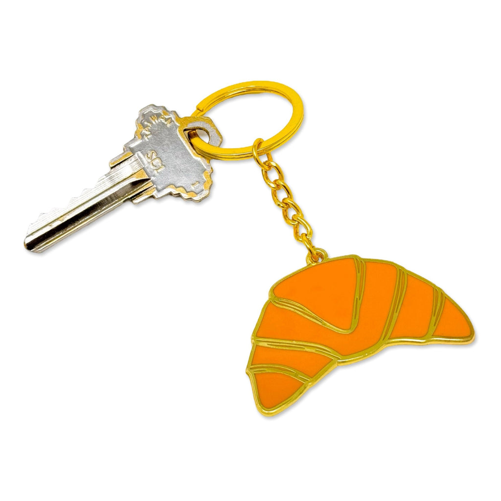 Croissant Enamel Keychain with key.