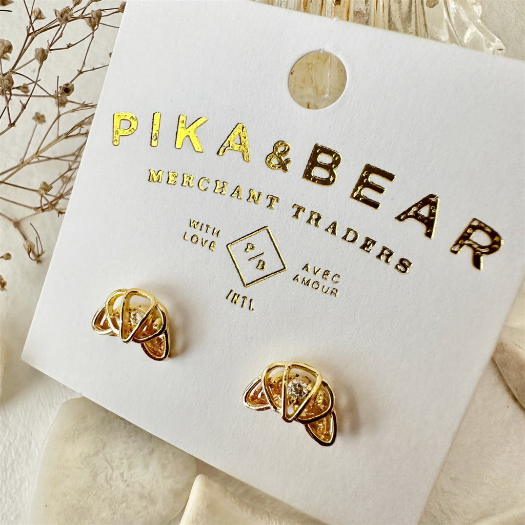 Croissant Rhinestone Stud Earrings Gold packaging.