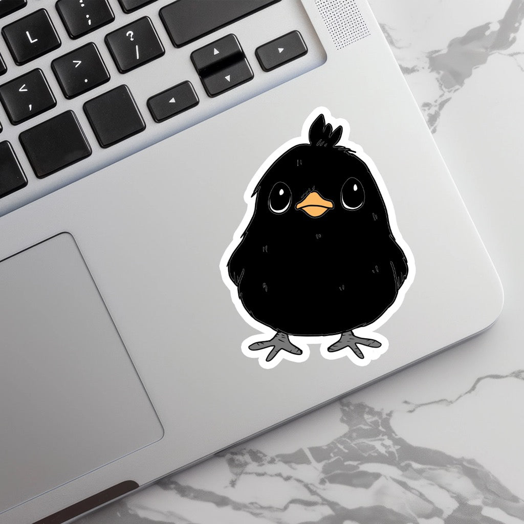 Crow Baby Sticker on computer.