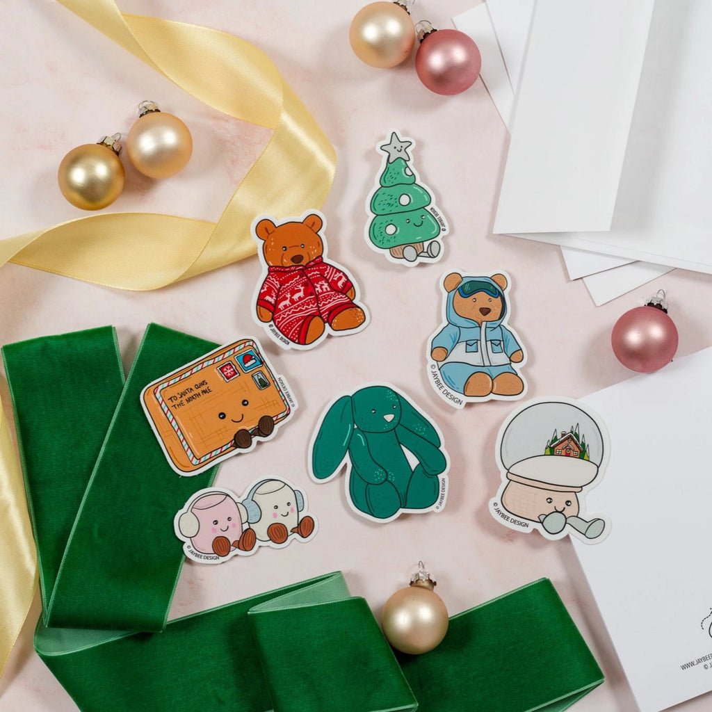 Cute Christmas Vinyl Sticker Pack on table.