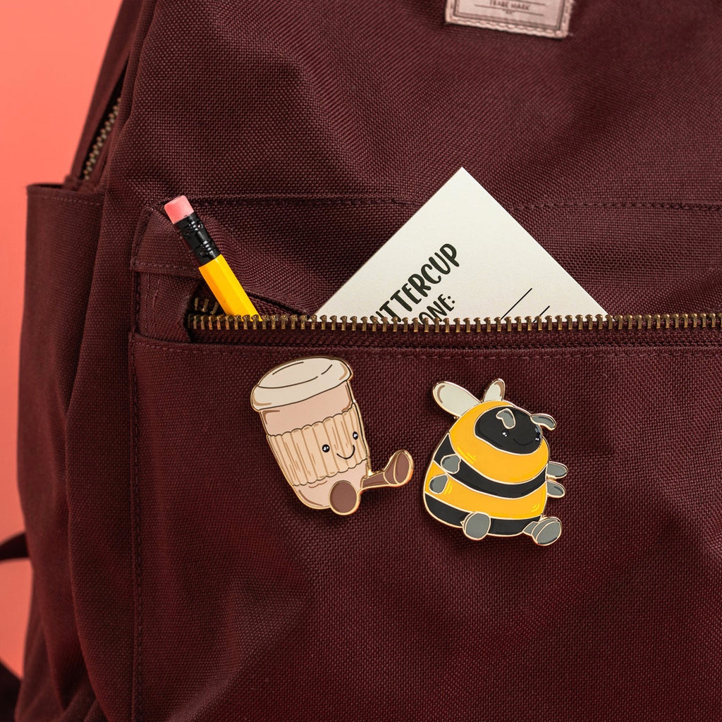 Cute Coffee Enamel Pin on jacket.