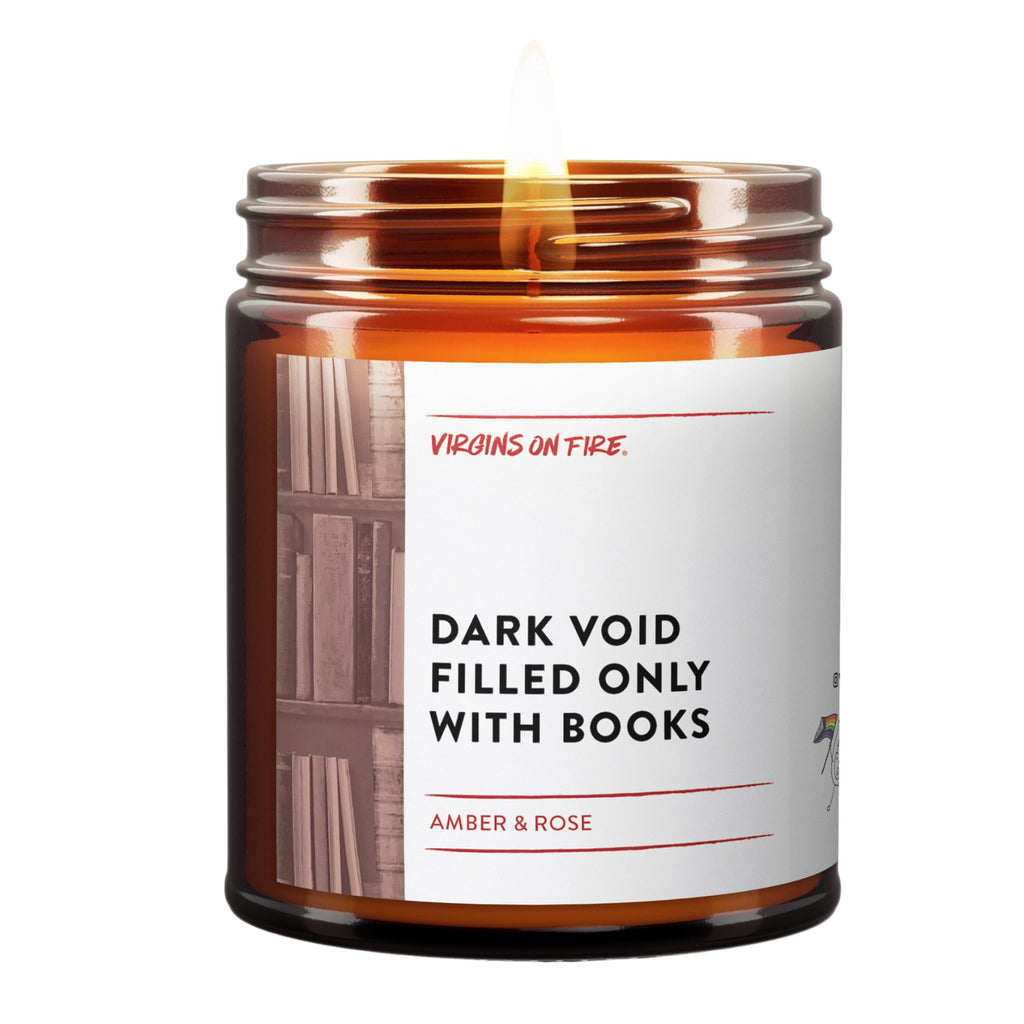 Dark Void Filled Only With Books Candle.
