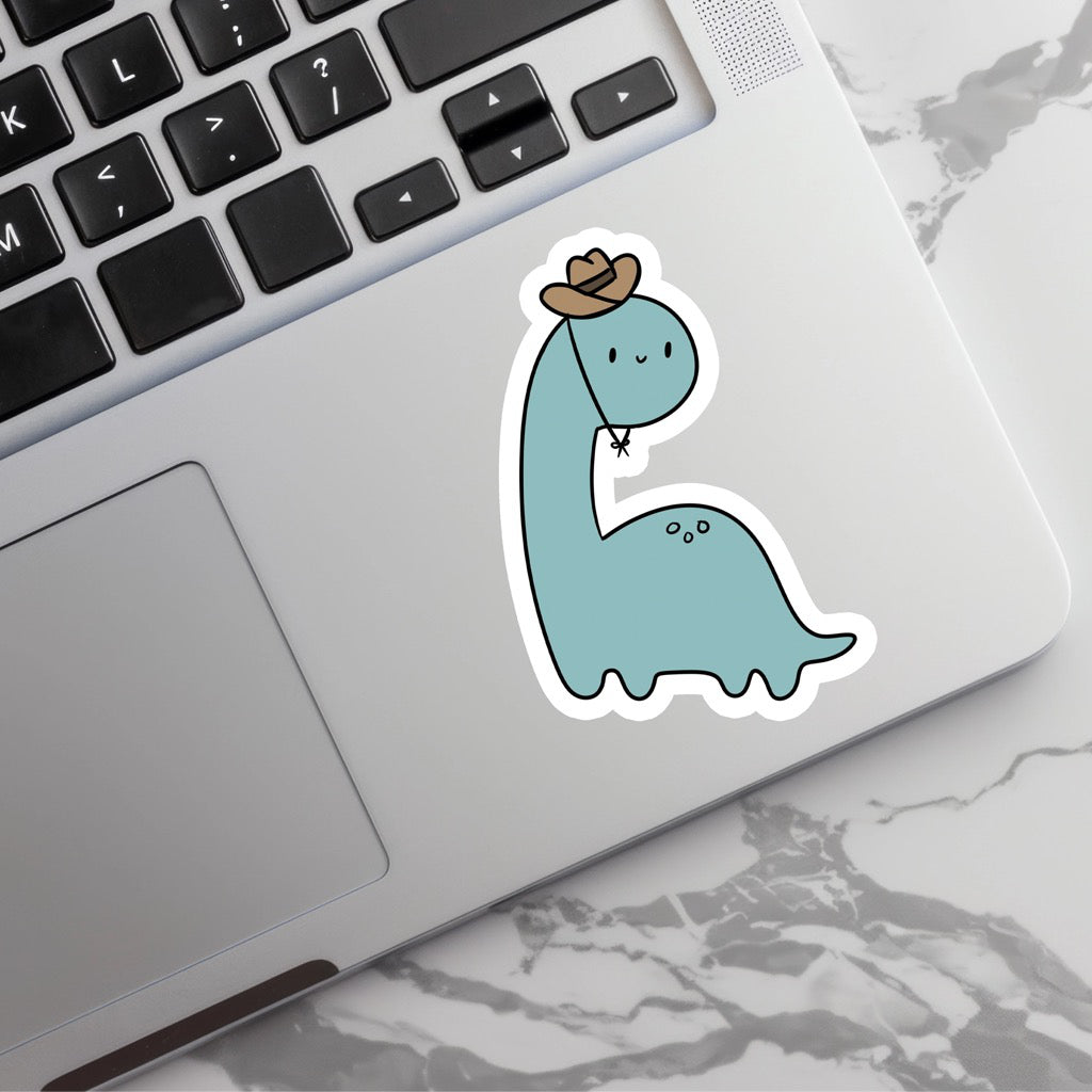 Dino Cowboy Sticker on computer.