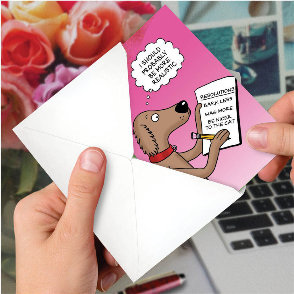 Dog Resolutions New Year Card in hand.