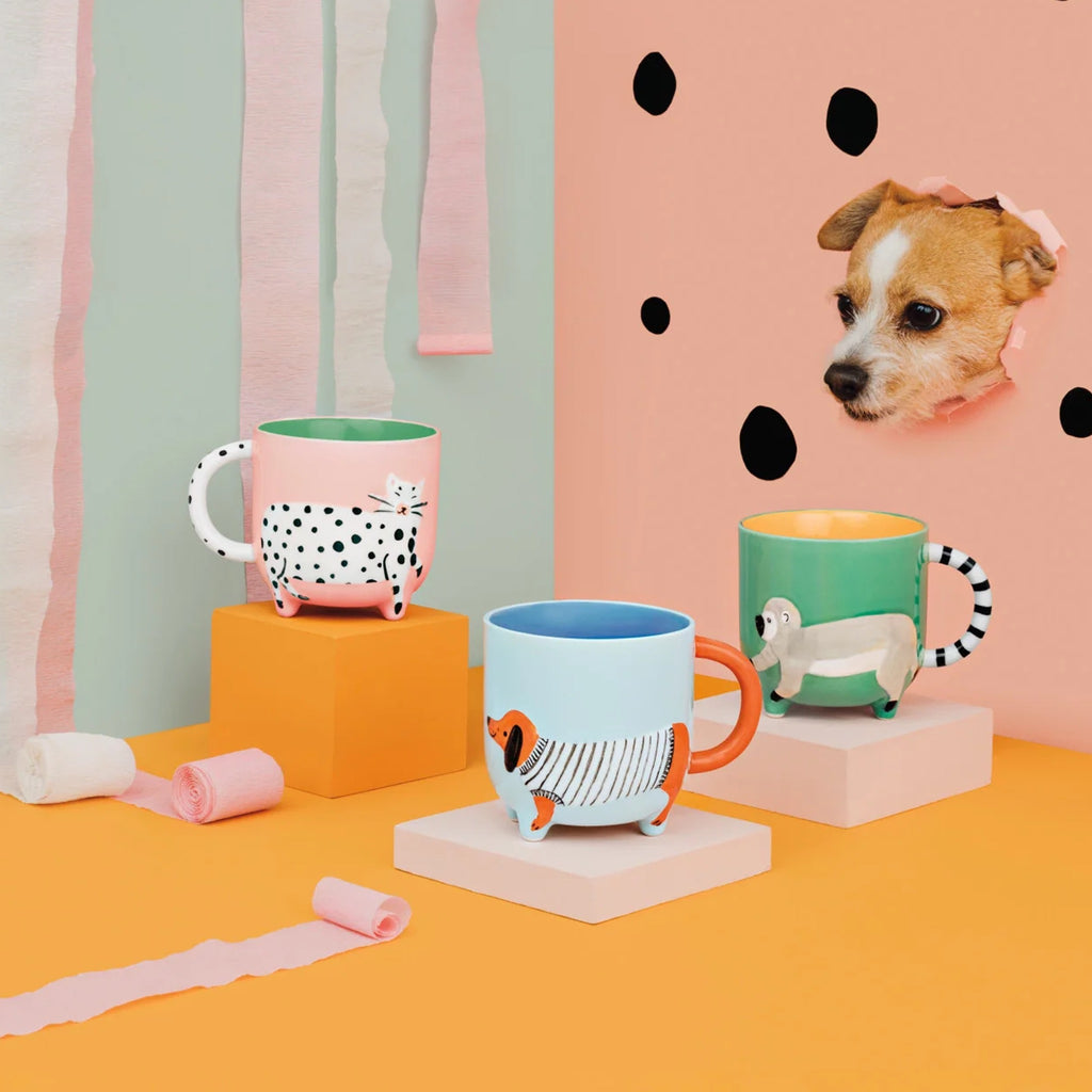 Dotty Cat Critter Mug on table.