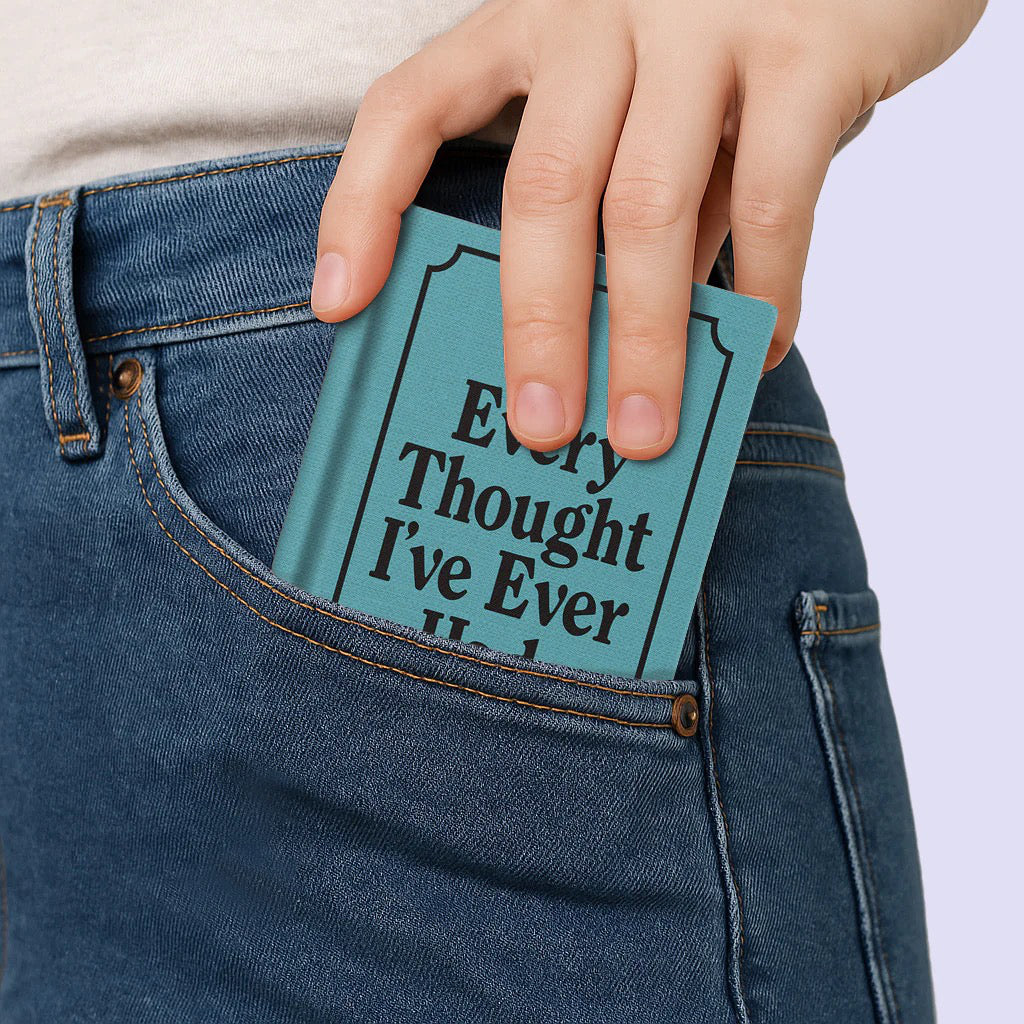 Every Thought I've Ever Had Mini Hardback Notebook in hand.